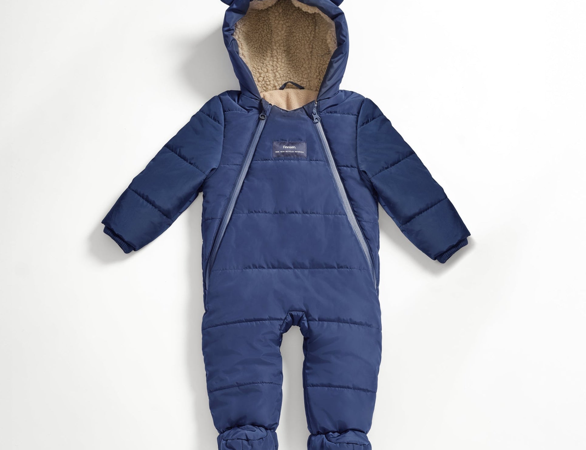 Anders Eco Snowsuit in navy, front view laid flat showing bear-ear hood, cream fleece lining and two front zips