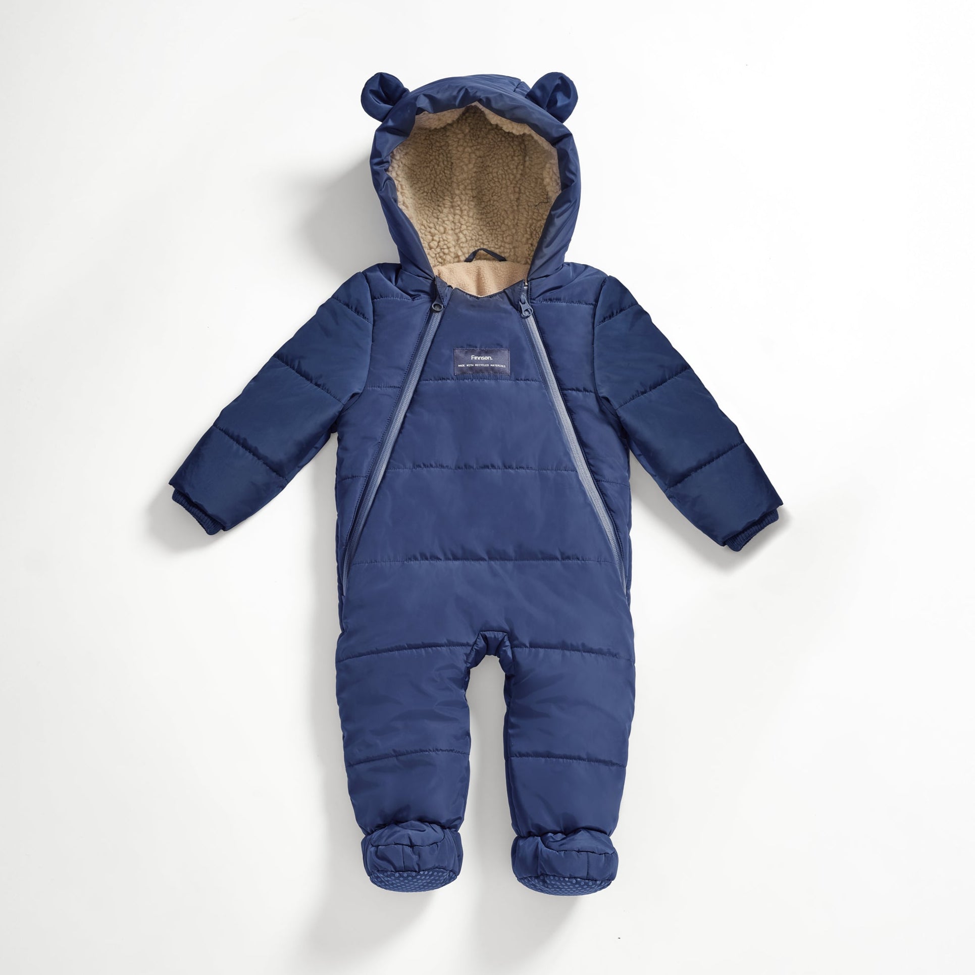 Anders Eco Snowsuit in navy, front view laid flat showing bear-ear hood, cream fleece lining and two front zips