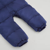Anders Eco Snowsuit Navy, close-up of the quilted legs and elasticated footless cuffs