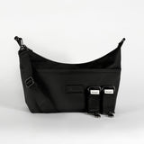 Fia Eco Stroller Organiser Black, front view with shoulder strap attached and two stroller clips laid beside it