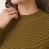 Rib Knit Peplum Khaki Jumper close-up of the ribbed knit and high funnel neckline on a smiling woman