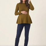 Rib Knit Peplum Khaki Jumper full-length front view, woman smiling with one hand on her bump and one touching her hair
