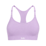 A light purple racerback sports bra with adjustable shoulder straps and a white 'lesh.' logo printed on the underband, shown against a plain white background.