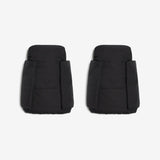 Pair of black puffer shorts on a white background