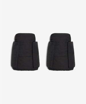 Pair of black puffer shorts on a white background