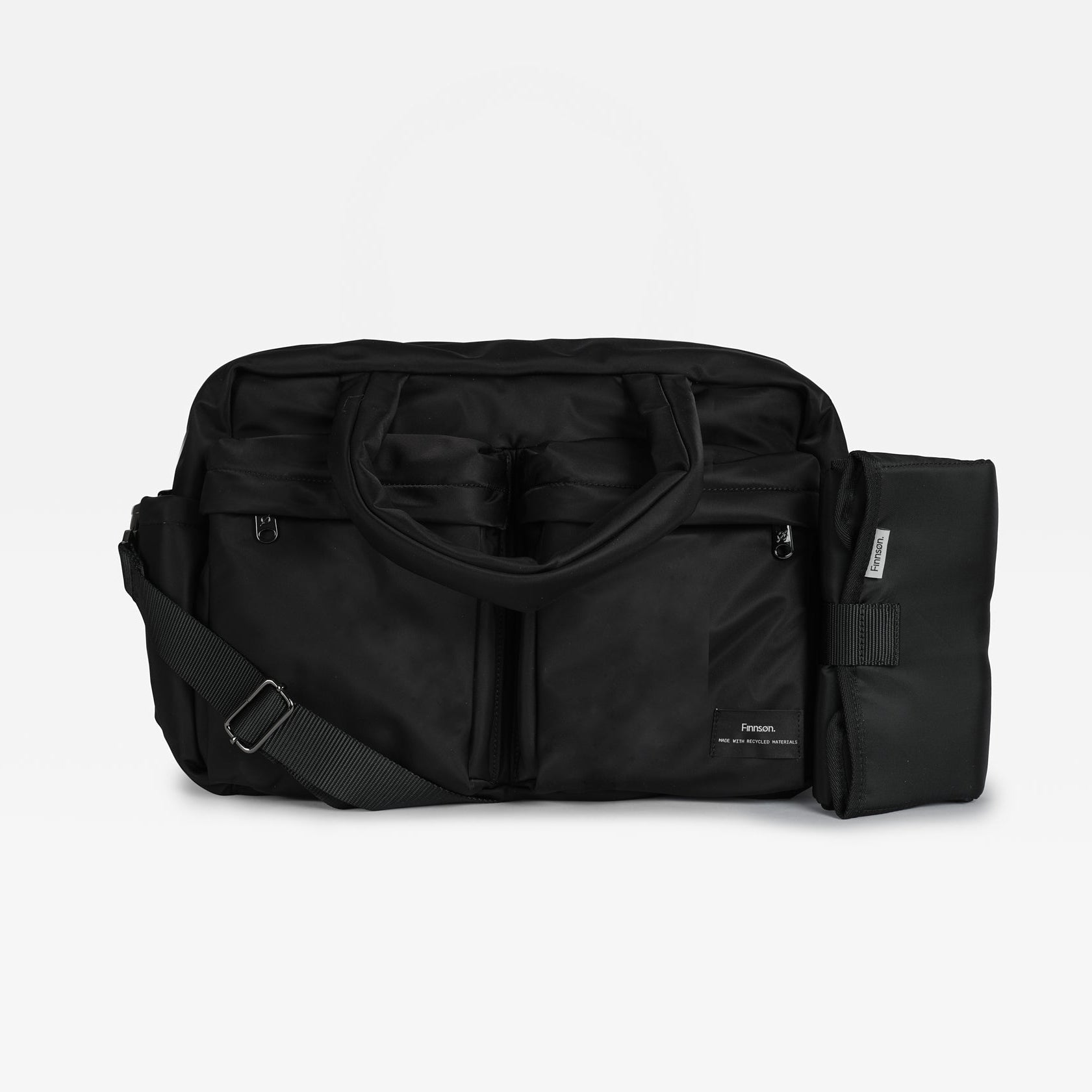 A black nylon duffel bag with a detachable shoulder strap and an attached black side pouch, shown against a plain light gray background.