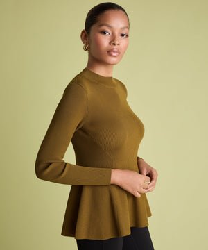 Peplum ribbed jumper in khaki on woman