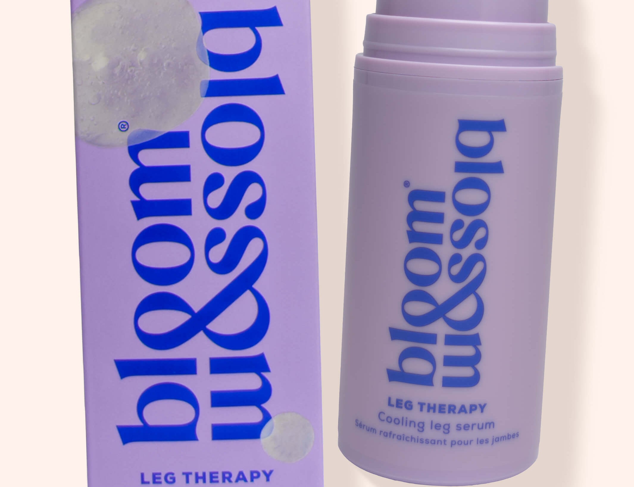 A lavender pump bottle and matching box of bloom blossom leg therapy cooling leg serum on a light beige background.