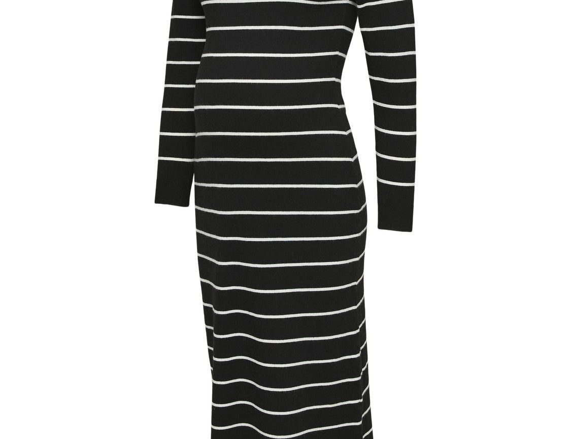 A long-sleeve knit midi dress with horizontal black and white stripes, shown against a plain white background.
