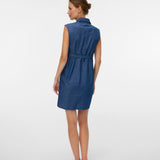 Woman wearing a blue dress on a white background