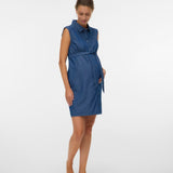 Woman wearing a blue dress on a white background