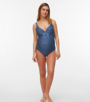 Woman wearing a blue striped swimsuit on a white background