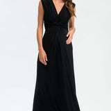 Woman wearing a black sleeveless dress on a white background