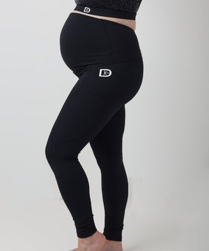 Black leggings with a logo on a white background