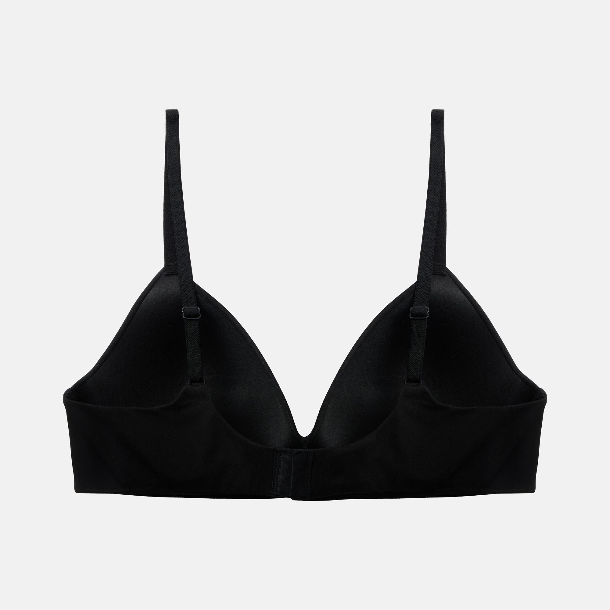 Black bra on a light gray background