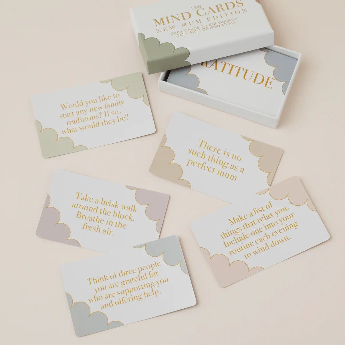 Set of cards with motivational messages on a beige background