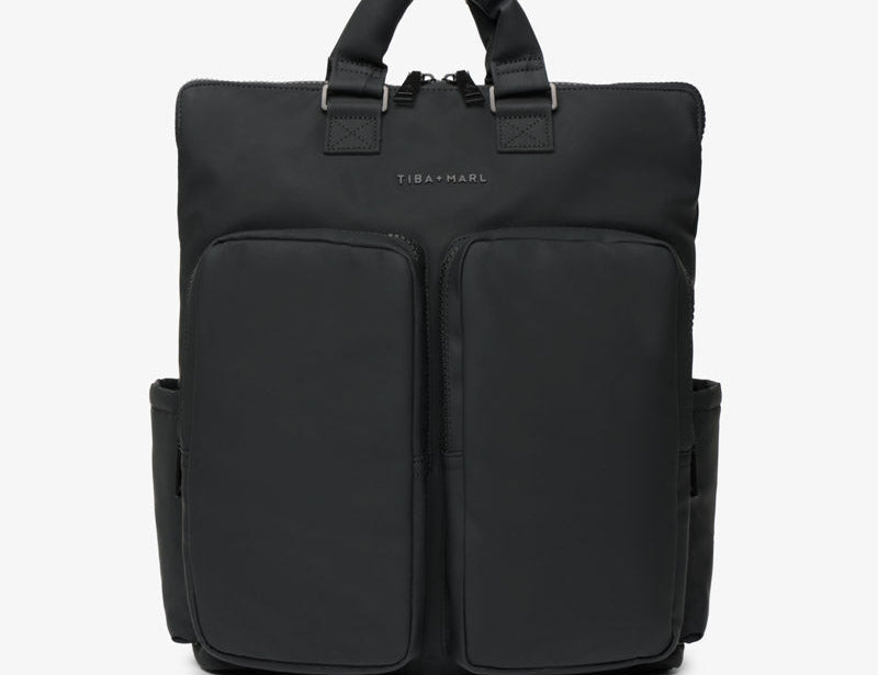 Black backpack with multiple compartments on a white background