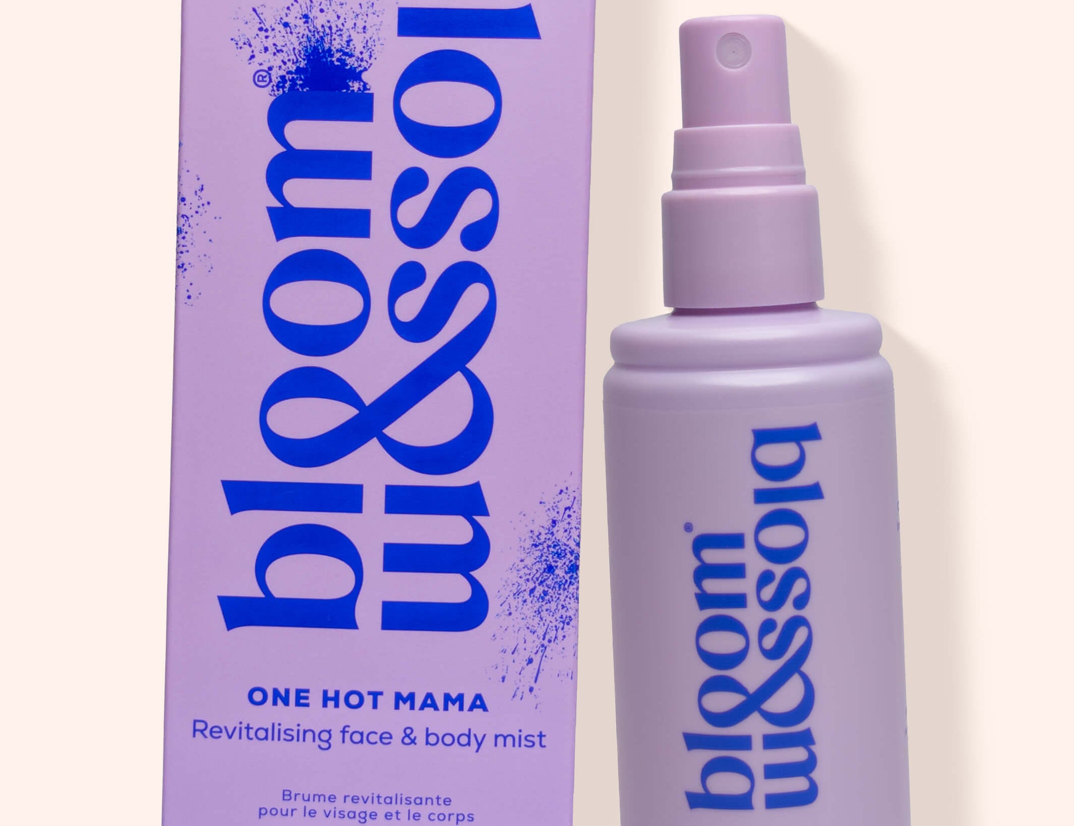 A lavender spray bottle and matching box for bloom missolia One Hot Mama Revitalising Face & Body Mist, set against a solid pale cream background.