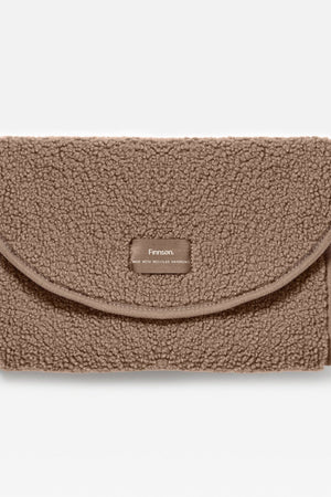 Oslo Eco Travel Changing Mat, Mocha Borg, folded closed with curved flap and small brand label, front view