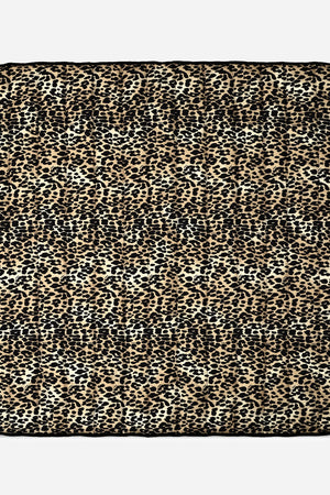 Thoren Eco Playmat in Leopard, flat top-down view of the quilted square mat with black edging