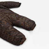 ANDERS Eco Snowsuit Chocolate Leopard close-up of the quilted sleeve and leg with ribbed cuffs, laid flat