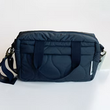 Navy blue bag with a strap on a white background