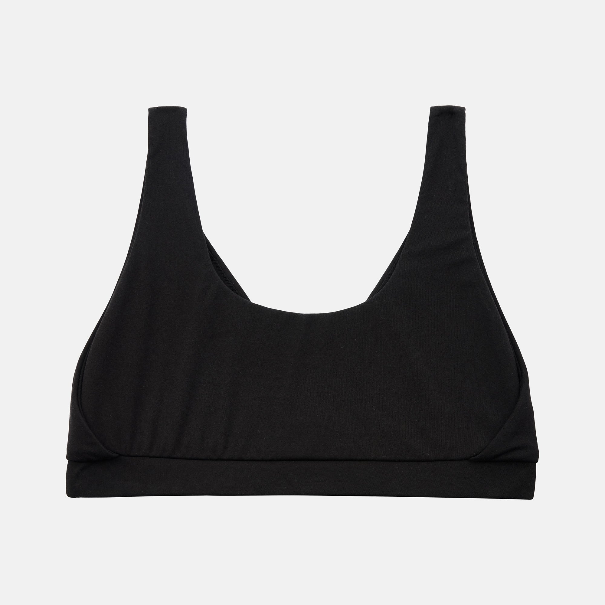 A black scoop-neck sports bra with wide shoulder straps, displayed flat against a light gray background.