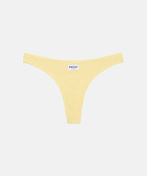 A pale yellow thong-style bikini bottom with a small white brand label reading RENUE at the center front, shown on a plain light gray background.