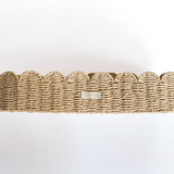 Ralphie Bear scallop edge baby changing basket in neutral tones with curved edges and woven texture.