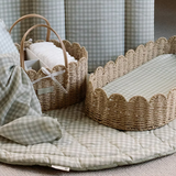 Ralphie Bear scallop edge baby changing basket in neutral tones with curved edges and woven texture.