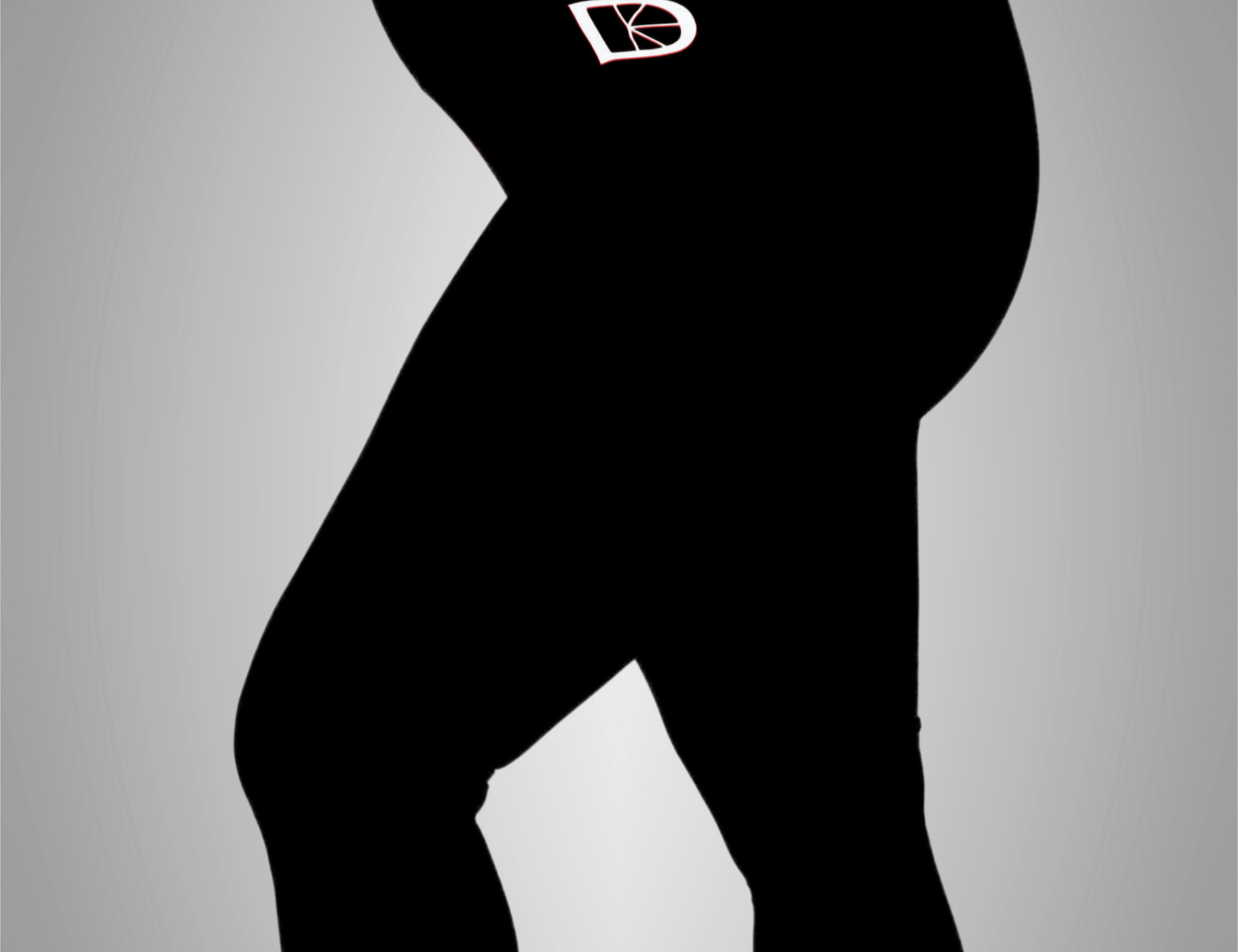 Black leggings with brand logos on a gray background