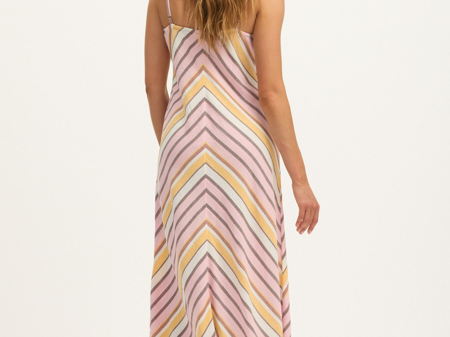 Model wearing Summery Copenhagen Martha Strap Midi Dress in Pink Mist – full back view