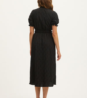 Model wearing Summery Copenhagen Karen Midi Dress in Black – back view