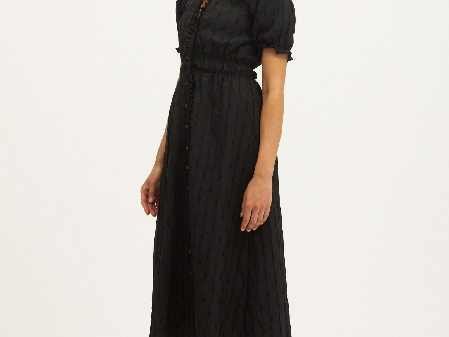 Model wearing Summery Copenhagen Karen Midi Dress in Black – side view