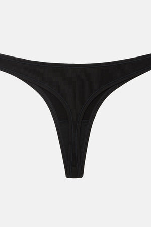 A pair of black ribbed thong underwear with a deep V-front and side cutouts, displayed flat against a light gray background.
