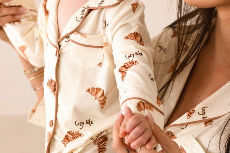 Mini Cozy Croissant Club Pyjamas with golden croissant print, by Cozy Crew Club