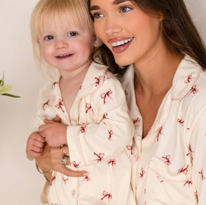 Mini Cozy Rosy Ribbon Pyjamas Set with pink bow print on cream, by Cozy Crew Club