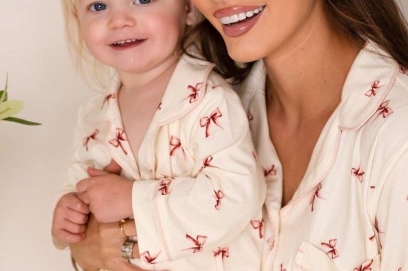 Mini Cozy Rosy Ribbon Pyjamas Set with pink bow print on cream, by Cozy Crew Club