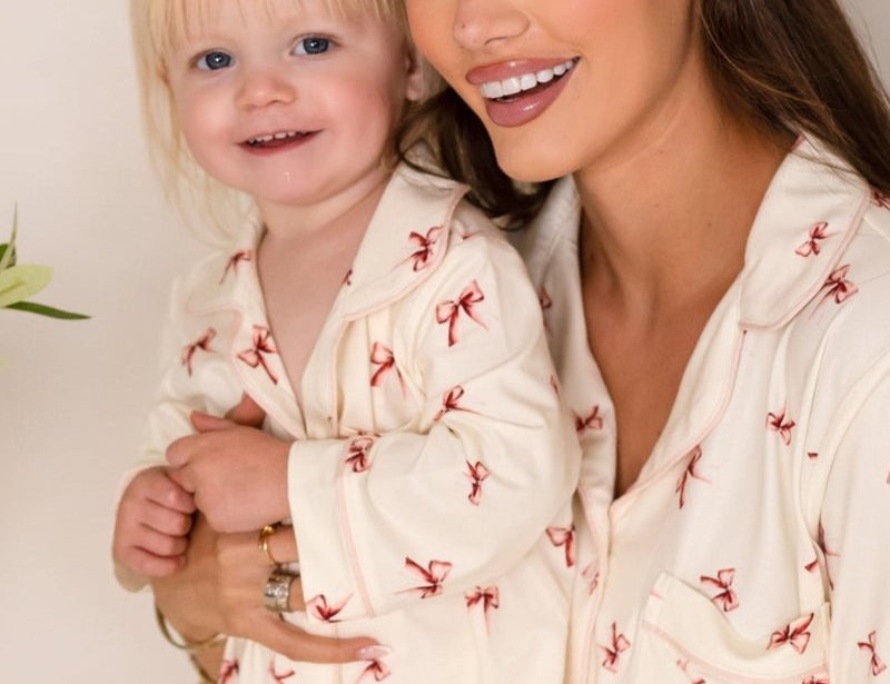 Mini Cozy Rosy Ribbon Pyjamas Set with pink bow print on cream, by Cozy Crew Club