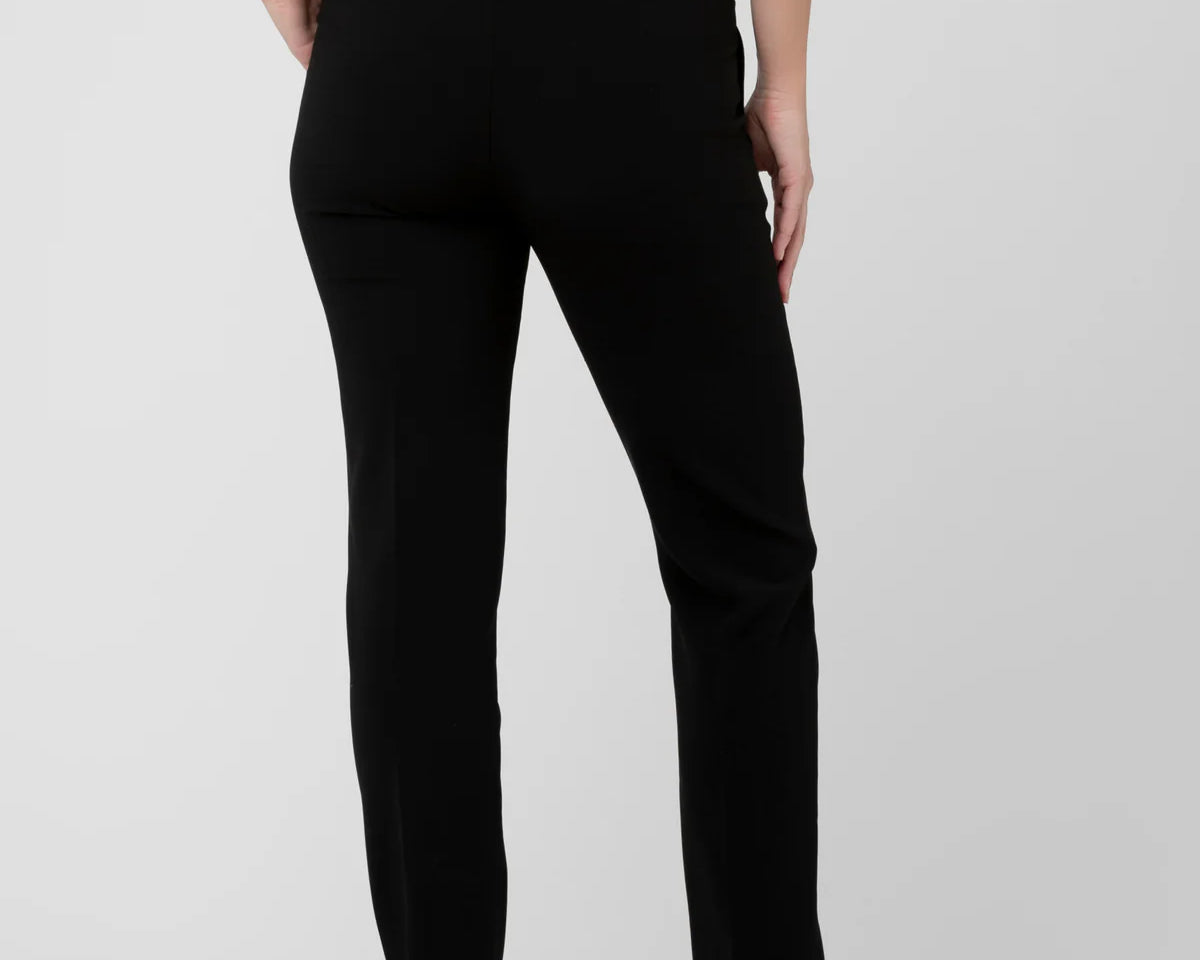 Person wearing black pants on a white background
