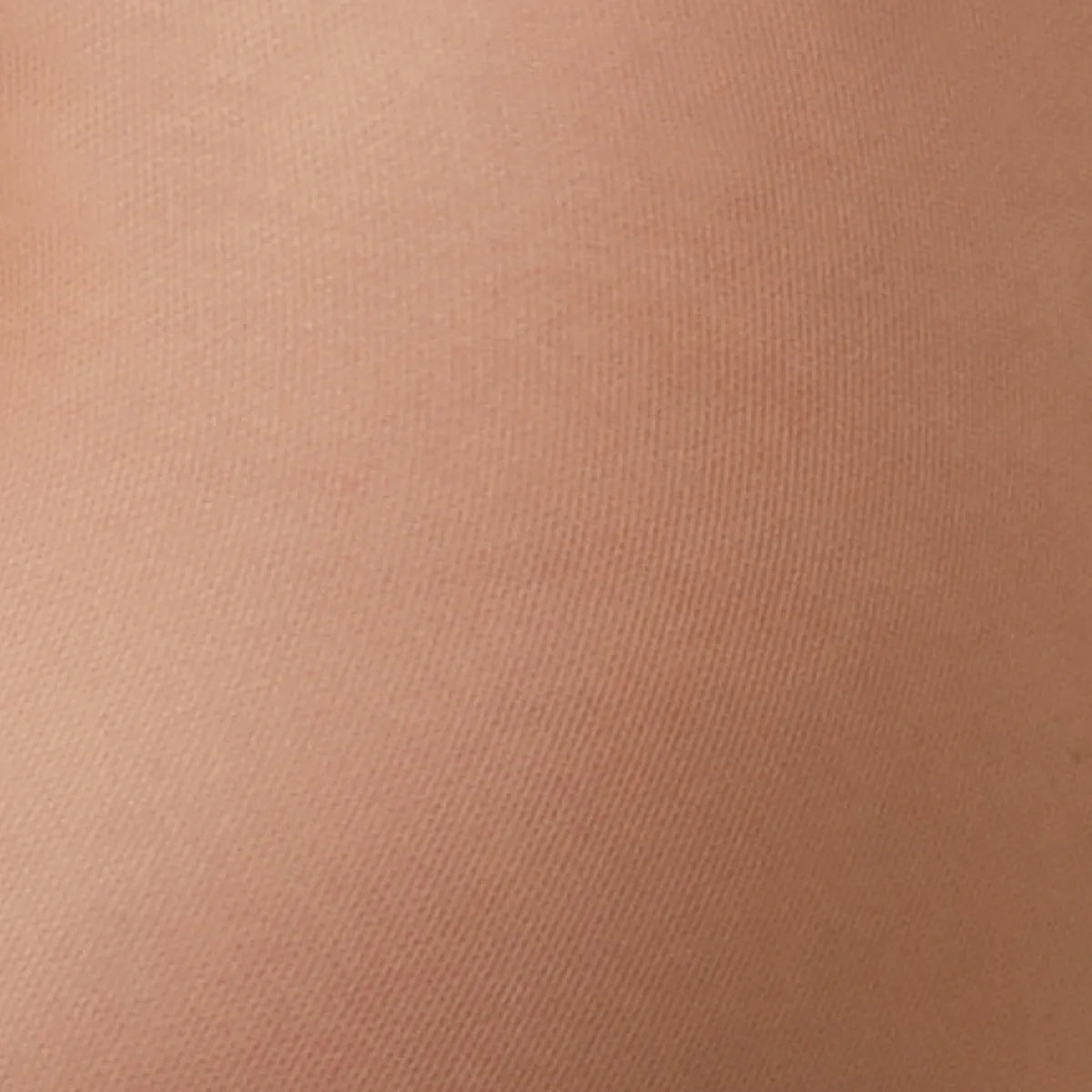 Close-up of a textured brown fabric surface
