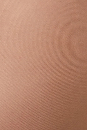 Close-up of a textured brown fabric surface