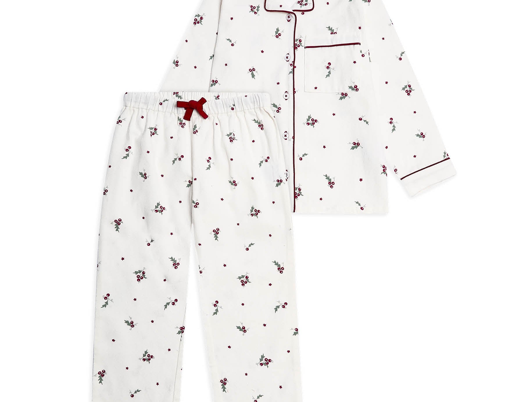 A two-piece children's pajama set featuring a white long-sleeve button-front top and matching pants, both printed with small red cherries and dots, finished with red piping and a red drawstring.