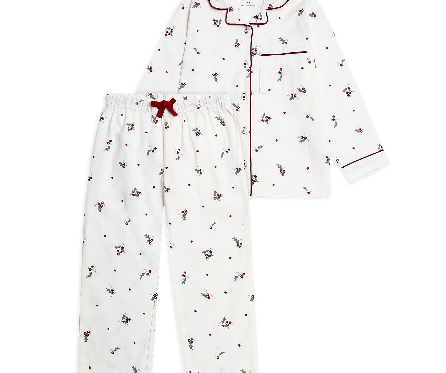 A two-piece children's pajama set featuring a white long-sleeve button-front top and matching pants, both printed with small red cherries and dots, finished with red piping and a red drawstring.