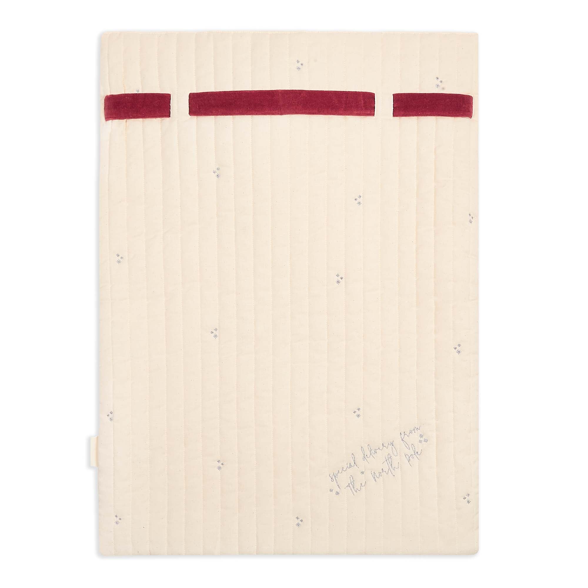 Beige notebook with red accents on a white background