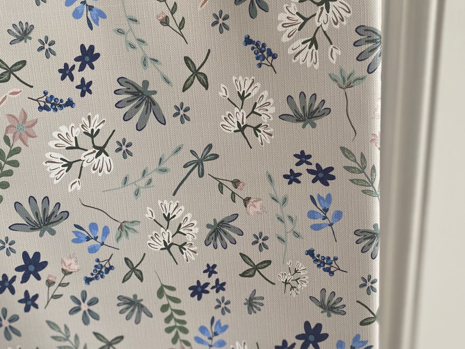Floral patterned paper with 'Ralphie Bear' branding on a white background