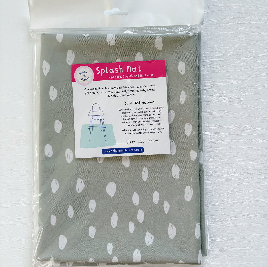 Splash Mat Sage Spots, packaged with a hanging header card and label showing a highchair and 110cm x 110cm size