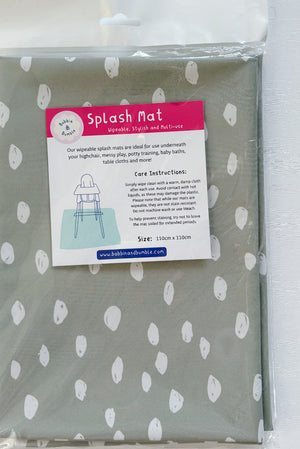 Splash Mat Sage Spots, packaged with a hanging header card and label showing a highchair and 110cm x 110cm size