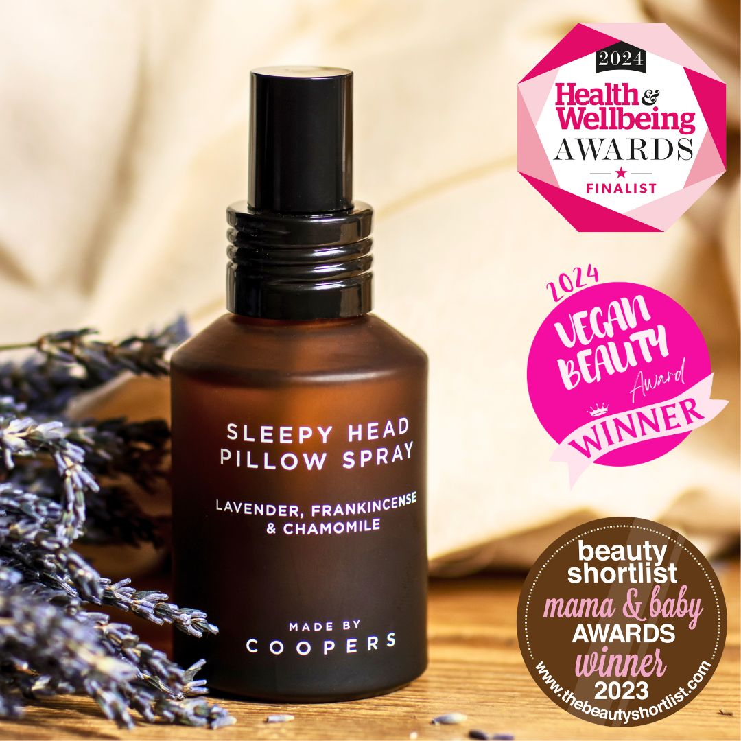 Sleepy Head Pillow Spray beside dried lavender, with Health and Wellbeing, Vegan Beauty and Beauty Shortlist award badges