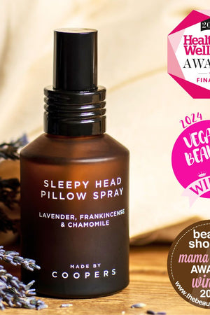 Sleepy Head Pillow Spray beside dried lavender, with Health and Wellbeing, Vegan Beauty and Beauty Shortlist award badges
